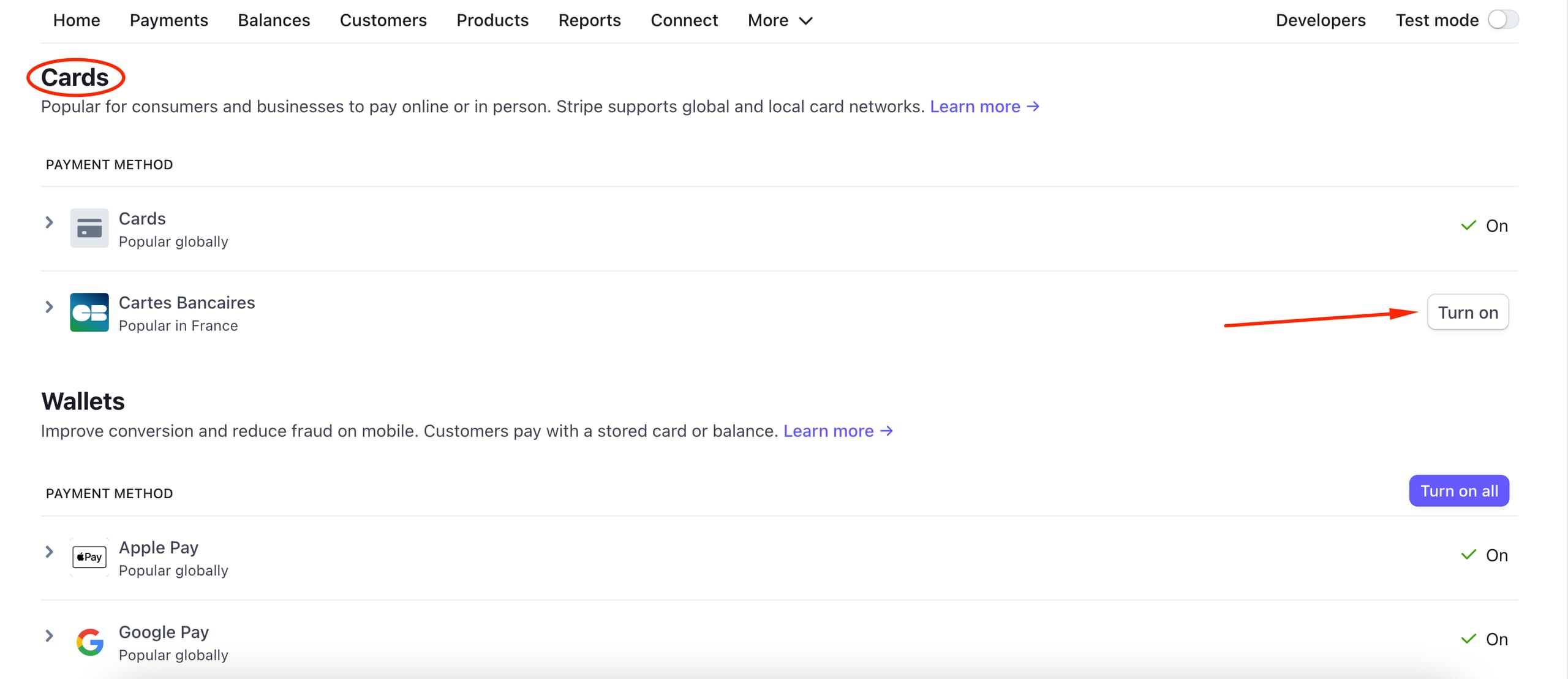 The button Turn on next to Cartes Bancaires in the Stripe payment methods settings