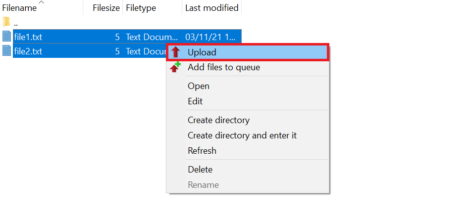 La opción Subir en el sitio Local de FileZilla