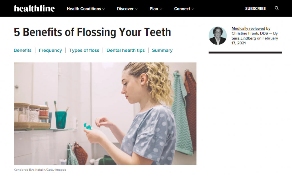El artículo sobre los 5 beneficios de usar hilo dental en el sitio web de Healthline