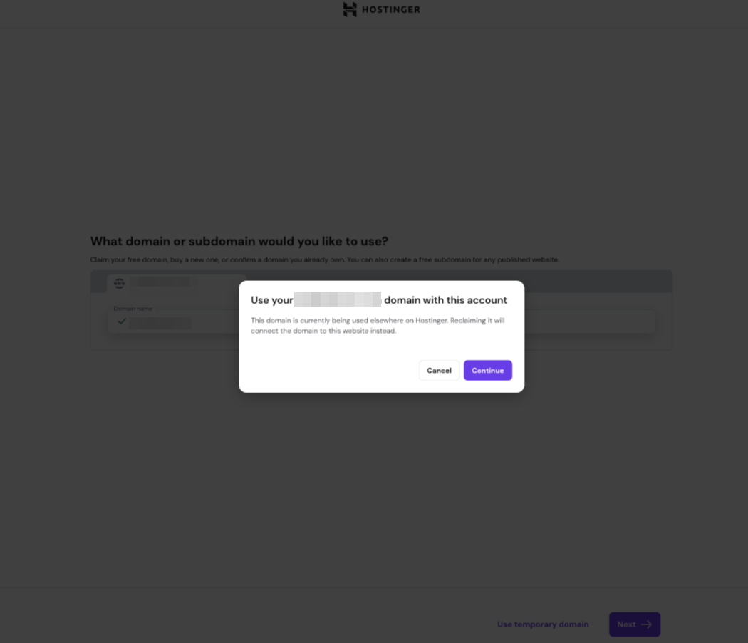 Hostinger domain use confirmation modal with Continue button highlighted