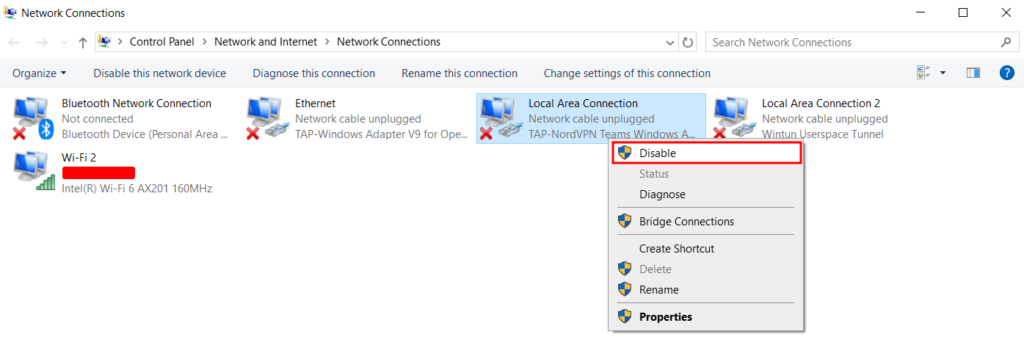 The Network Connections section on Windows, with the Disable option highlighted in red
