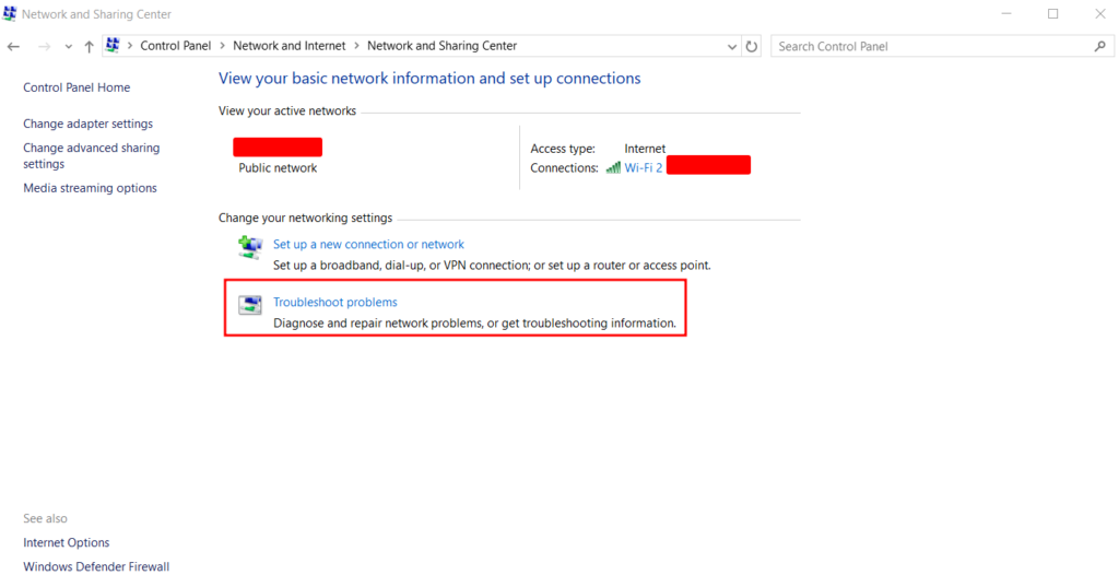 The Network and Sharing Center section on Windows, with Troubleshoot problems highlighted in red