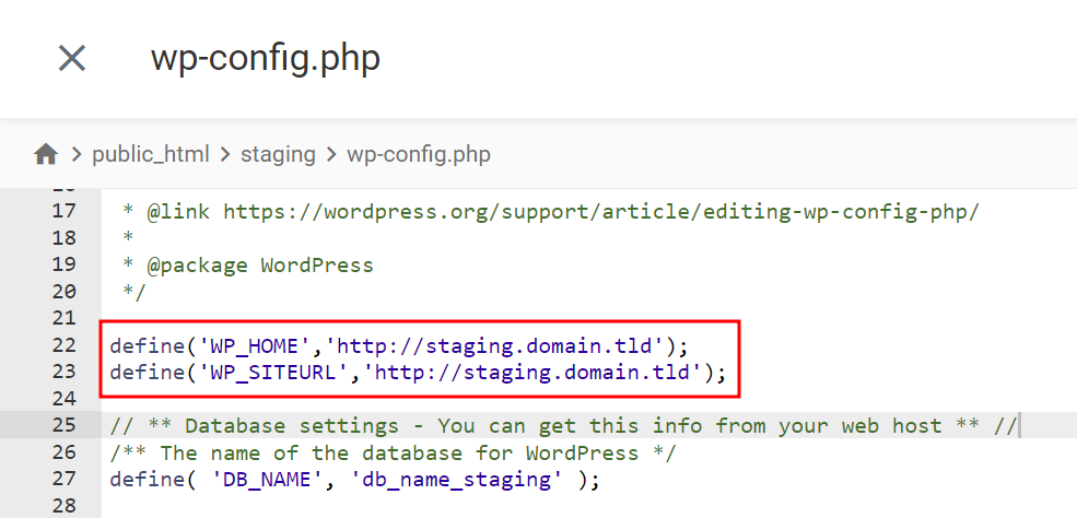 The content of wp-config.php file, highlighting the syntax to define the staging site URL
