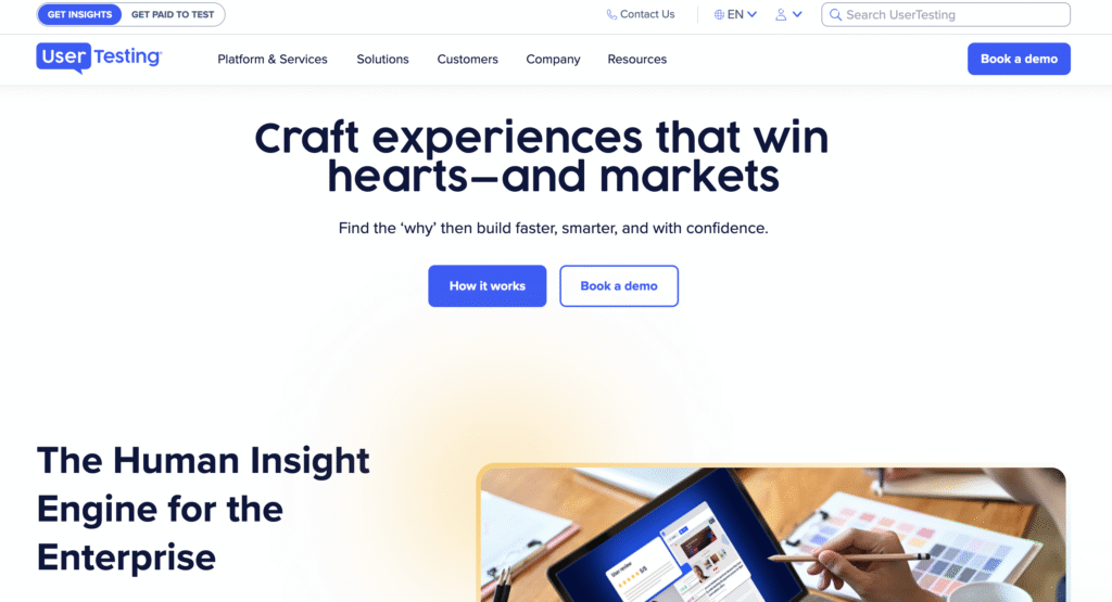 A UserTesting homepage featuring a tagline about crafting winning experiences and a visual of a person using a tablet.