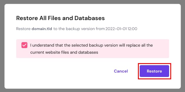 Warning indicating that the selected backup will replace all the current website files and databases